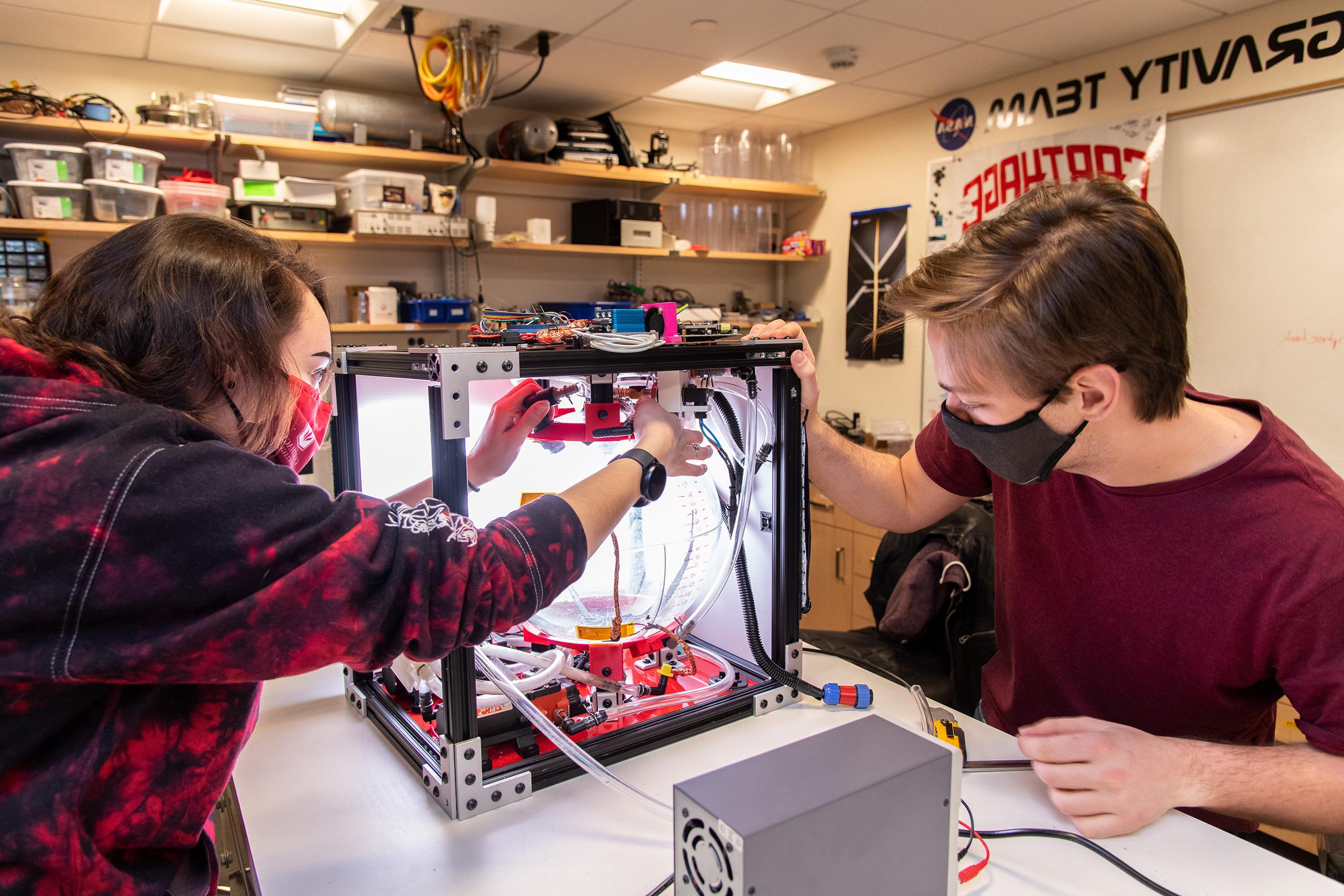 Carthage Microgravity Team working on their experiment.